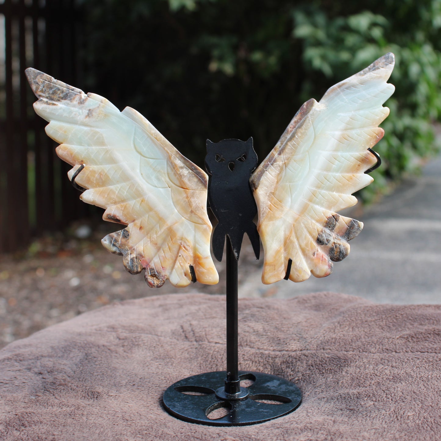 Amazonite Owl Wings crystal sculpture mounted on a black metal stand by Different Branches LLC