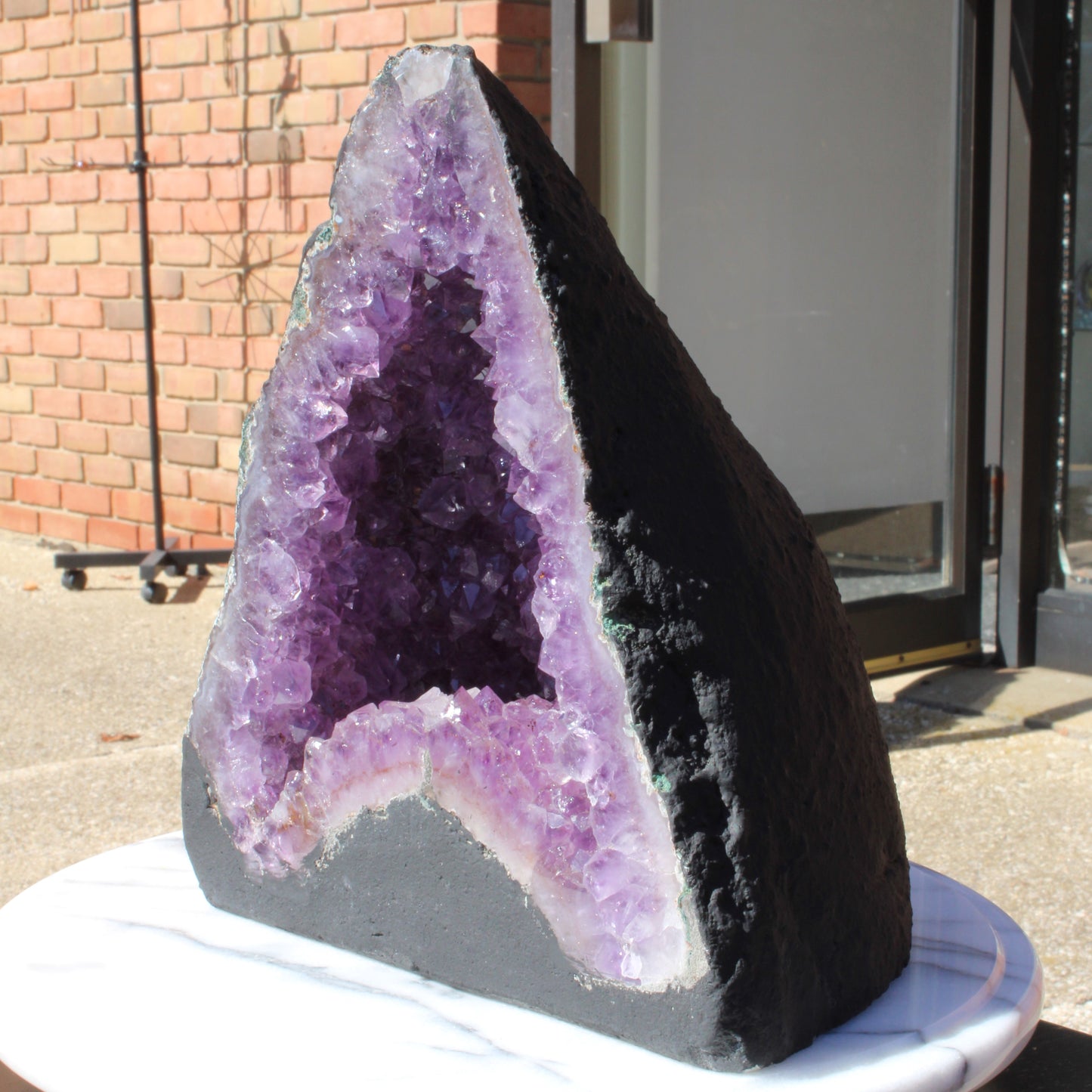 Amethyst Cathedral Crystal Display with Vibrant Purple Quartz Inside and Natural Black Exterior