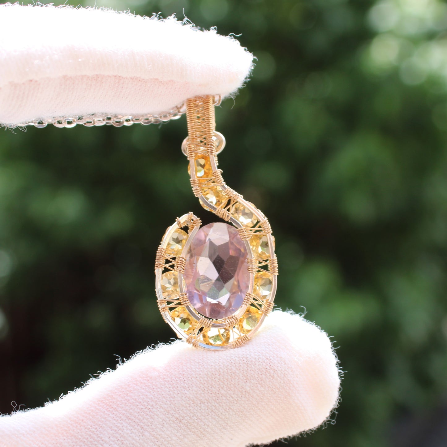 Elegant amethyst citrine pendant set in gold with intricate detailing, perfect for special occasions