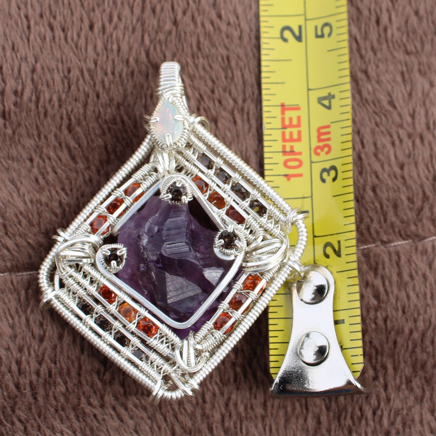 Unique amethyst garnet opal silver wire-wrapped pendant by Different Branches LLC measuring about 2 inches