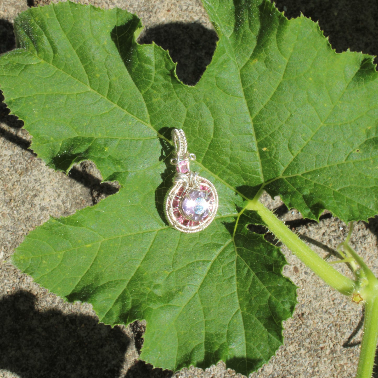 Amethyst Sterling Silver pendant with pink tourmaline set on a green leaf for natural elegance