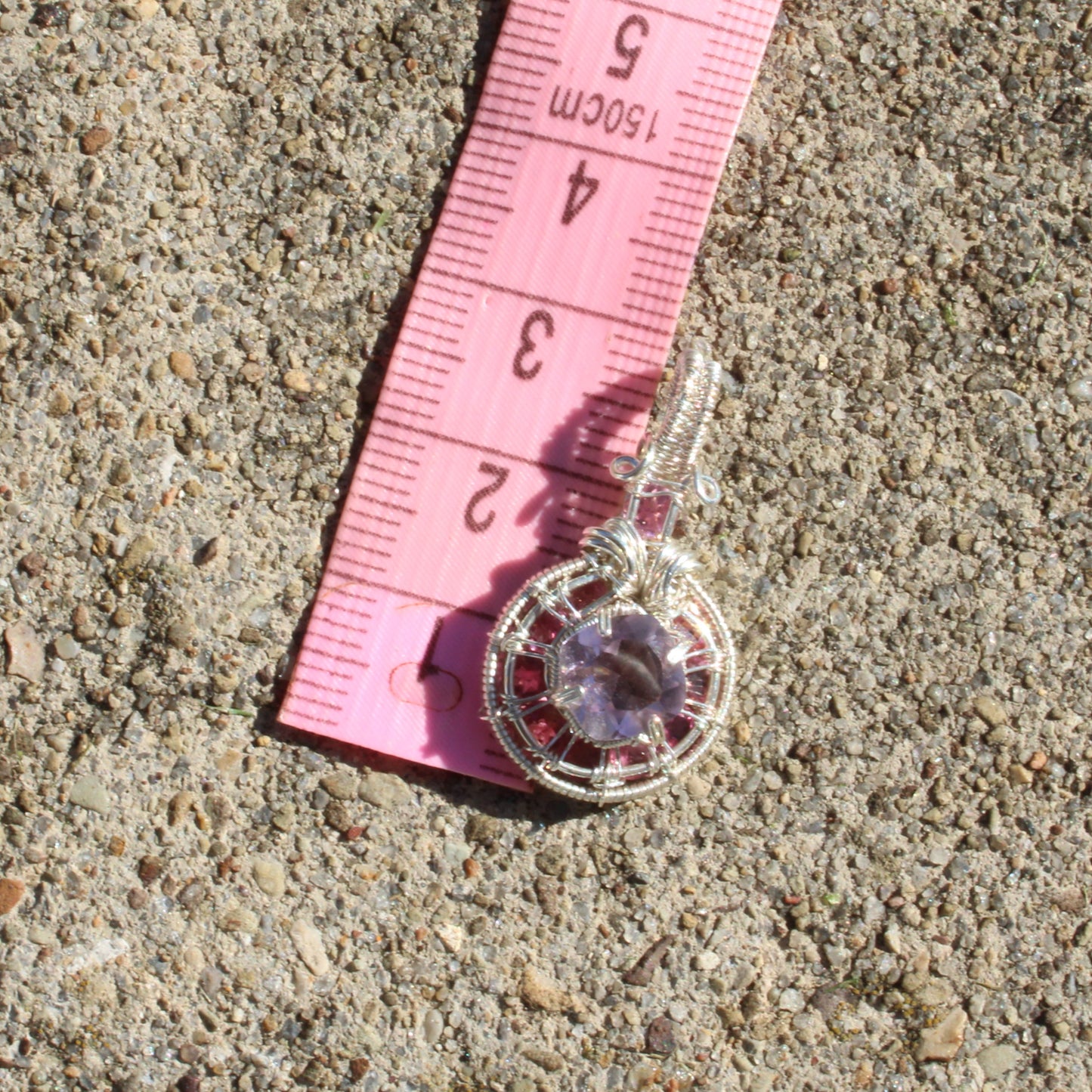 Amethyst Sterling Silver pendant featuring pink tourmaline stones and intricate wire design