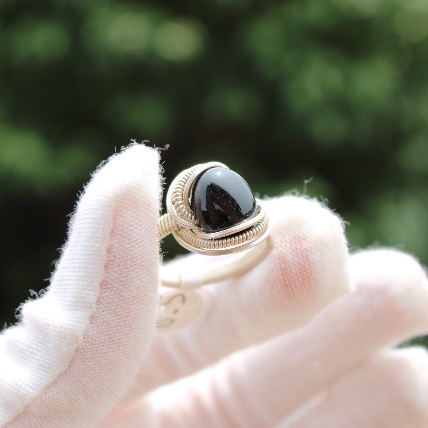 Black Tourmaline Handmade Sterling Ring showcased on a gloved hand for a elegant jewelry presentation