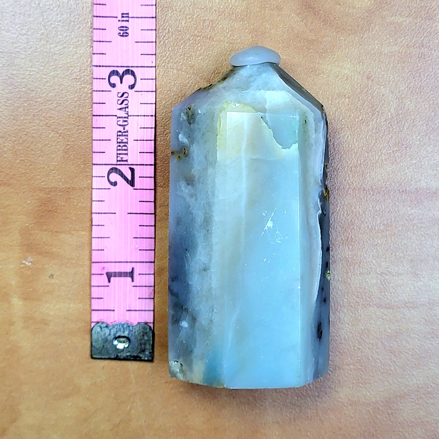 Caribbean Calcite towers with a smooth finish showcasing stunning blue and gray hues