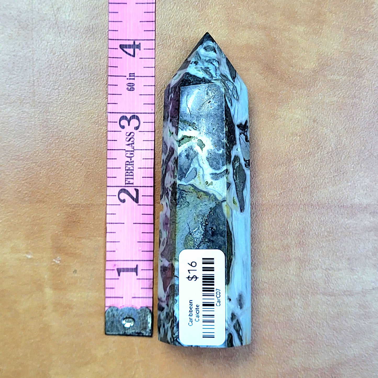 Caribbean Calcite towers featuring a stunning natural pattern and polished finish, measuring approximately 6 inches