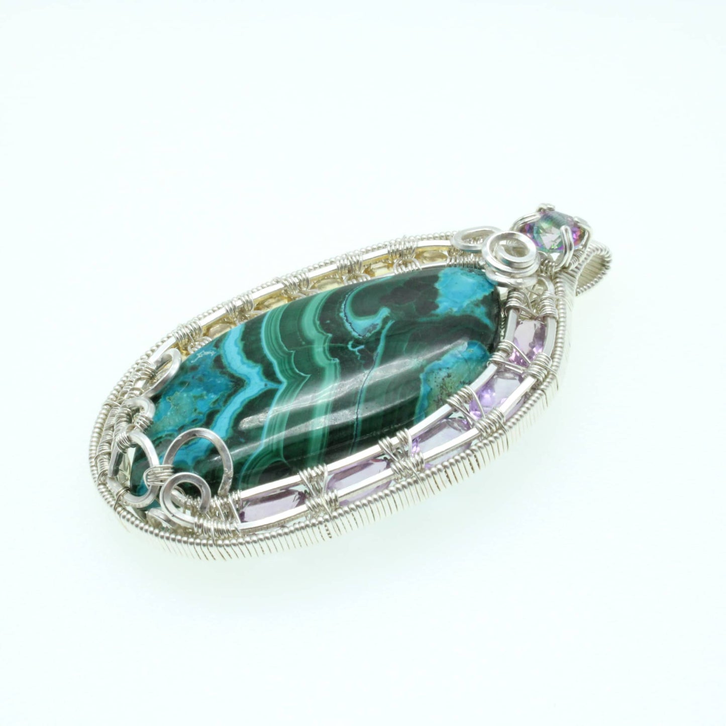 Chrysocolla Malachite sterling silver pendant featuring intricate wire detailing and vibrant colors