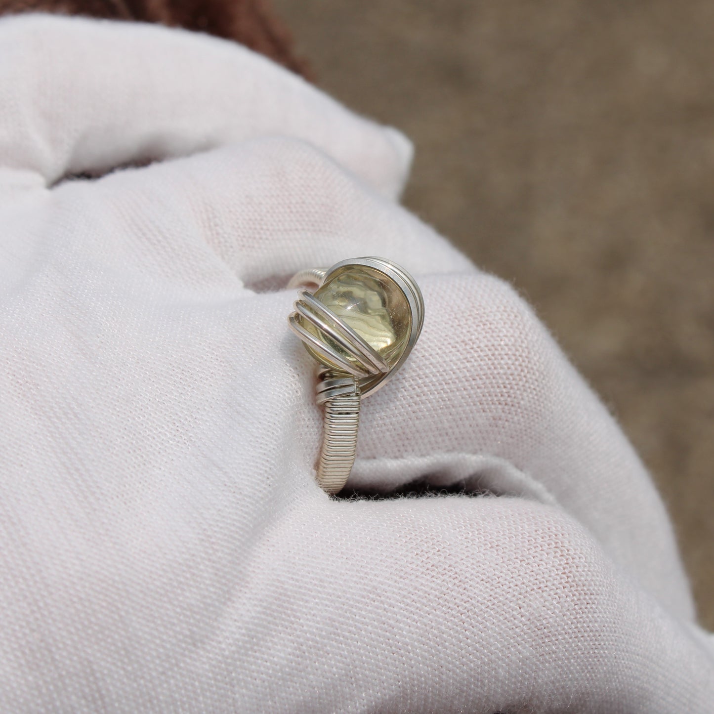 Elegant Citrine ring with a unique twisted band setting for a stylish look