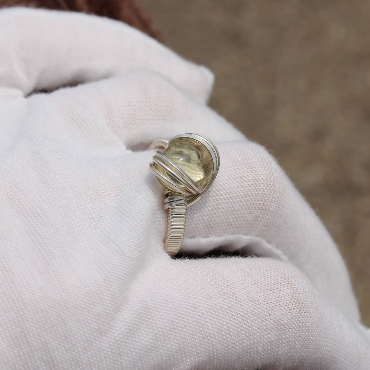 Elegant Citrine ring with a unique twisted band setting for a stylish look