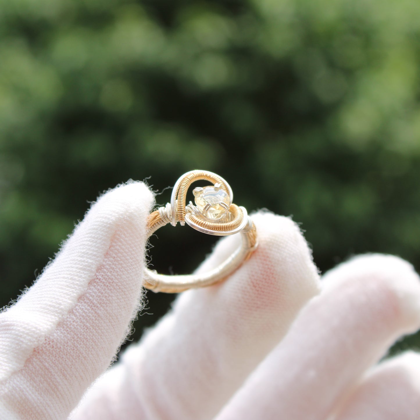 Elegant Citrine Sterling Silver Ring featuring a unique twisted design and a sparkling stone
