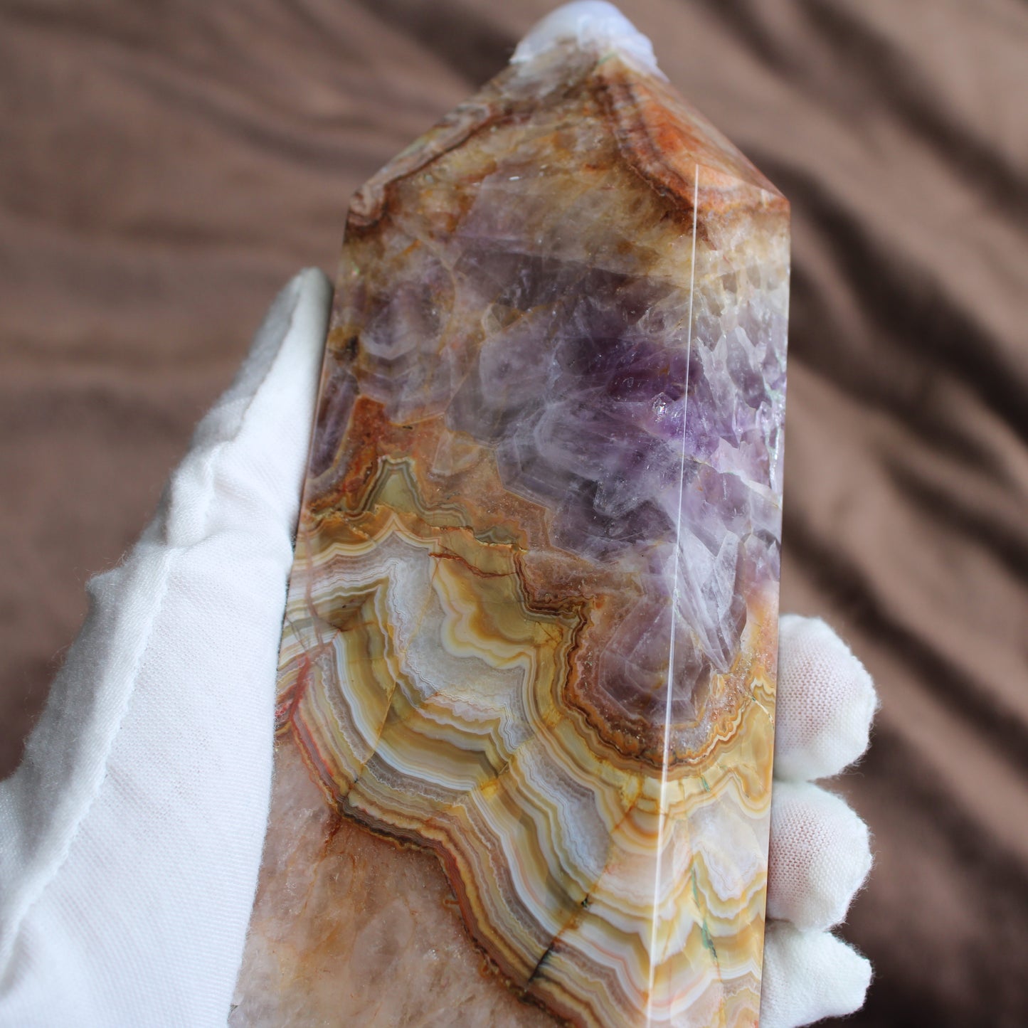 Beautiful Crazy lace amethyst tower with vibrant colors and unique patterns, perfect for home decor