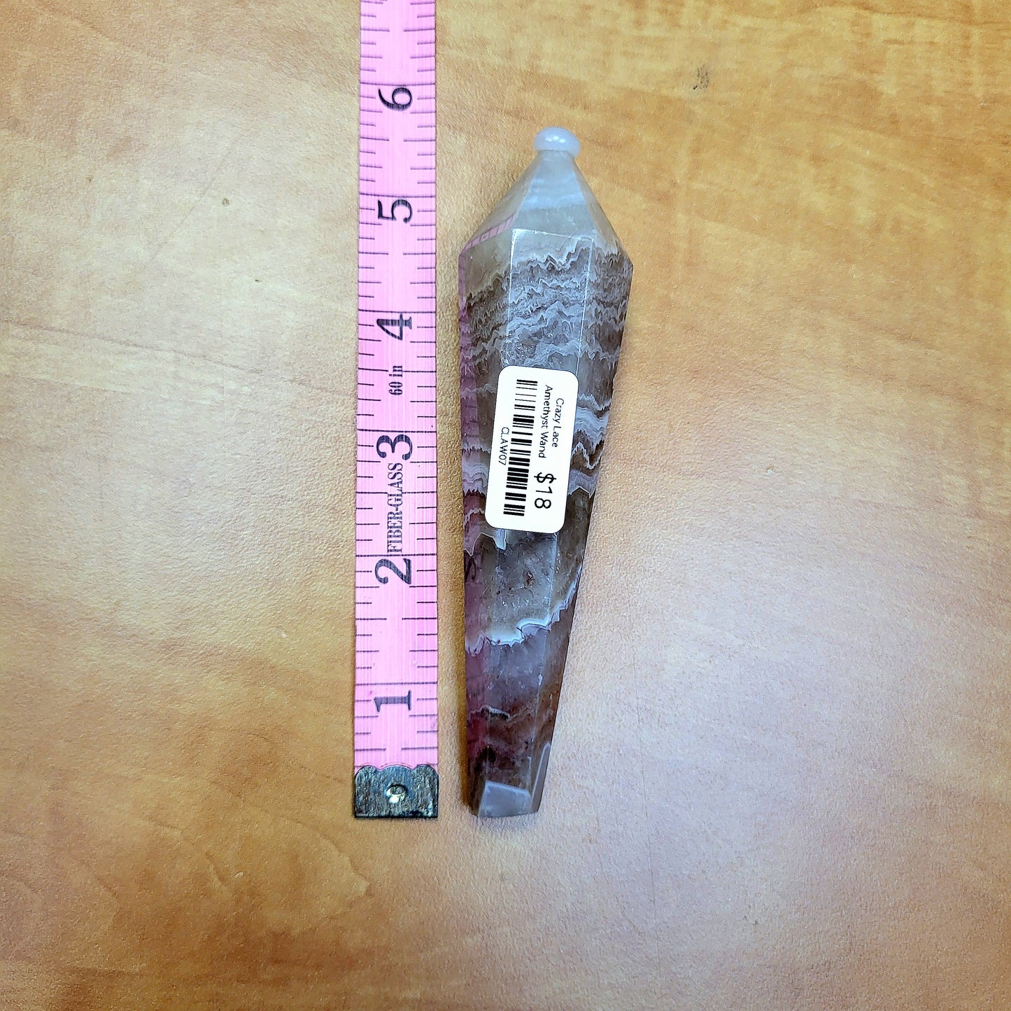 Unique Crazy Lace Amethyst Wand with intricate patterns and a smooth finish, perfect for healing and decoration