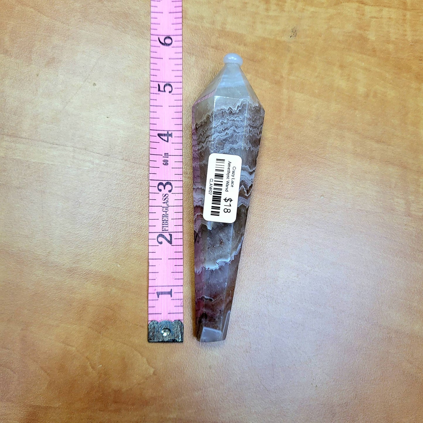 Unique Crazy Lace Amethyst Wand with intricate patterns and a smooth finish, perfect for healing and decoration