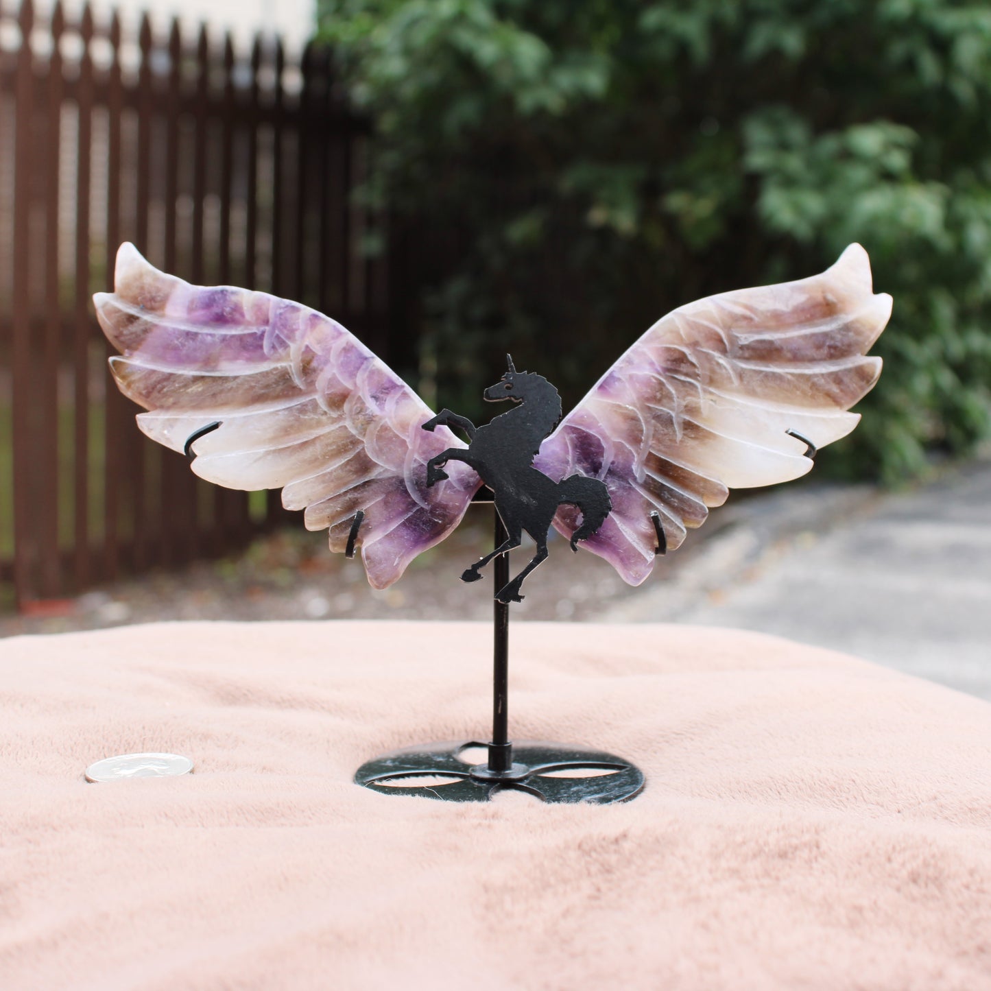 Dream Amethyst Unicorn Wings crystal decorative piece with purple and white translucent wings on metal stand