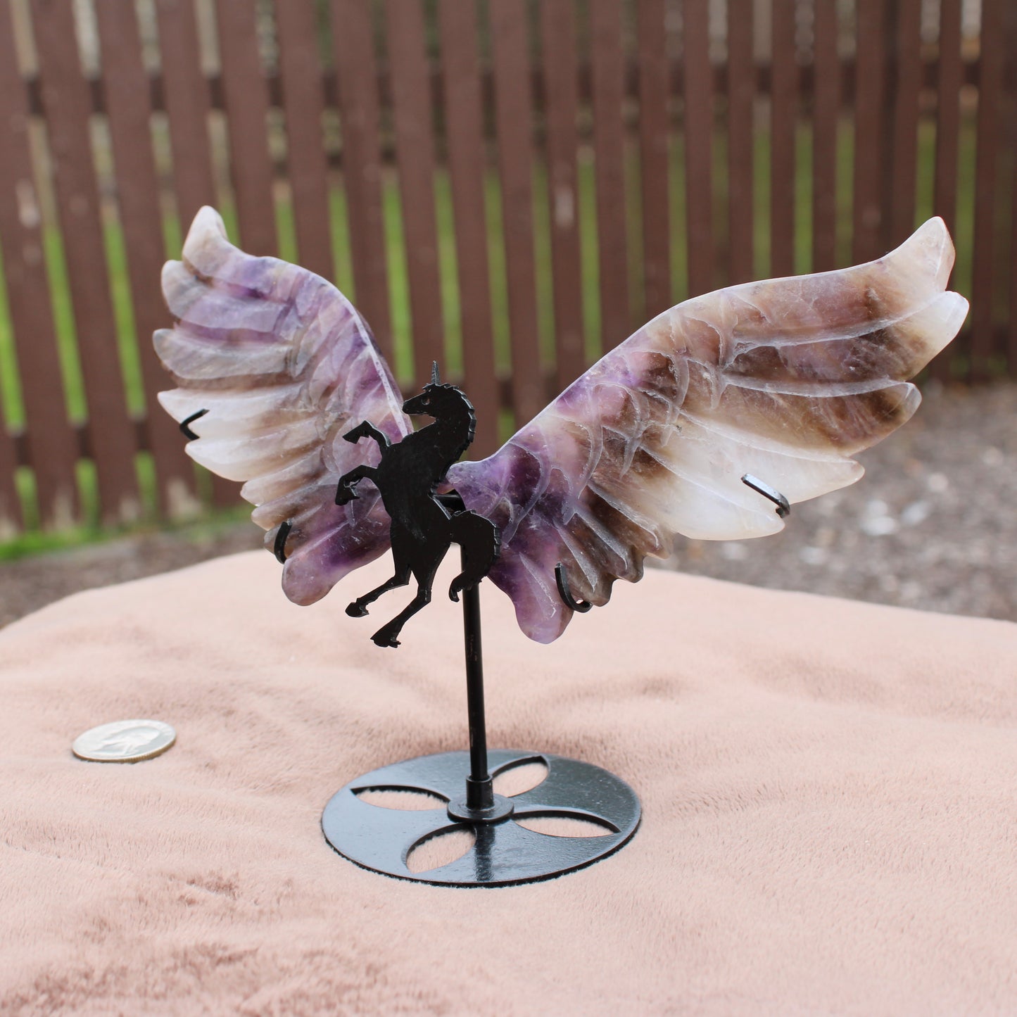 Dream Amethyst Unicorn Wings crystal sculpture with purple and white wings on black metal stand