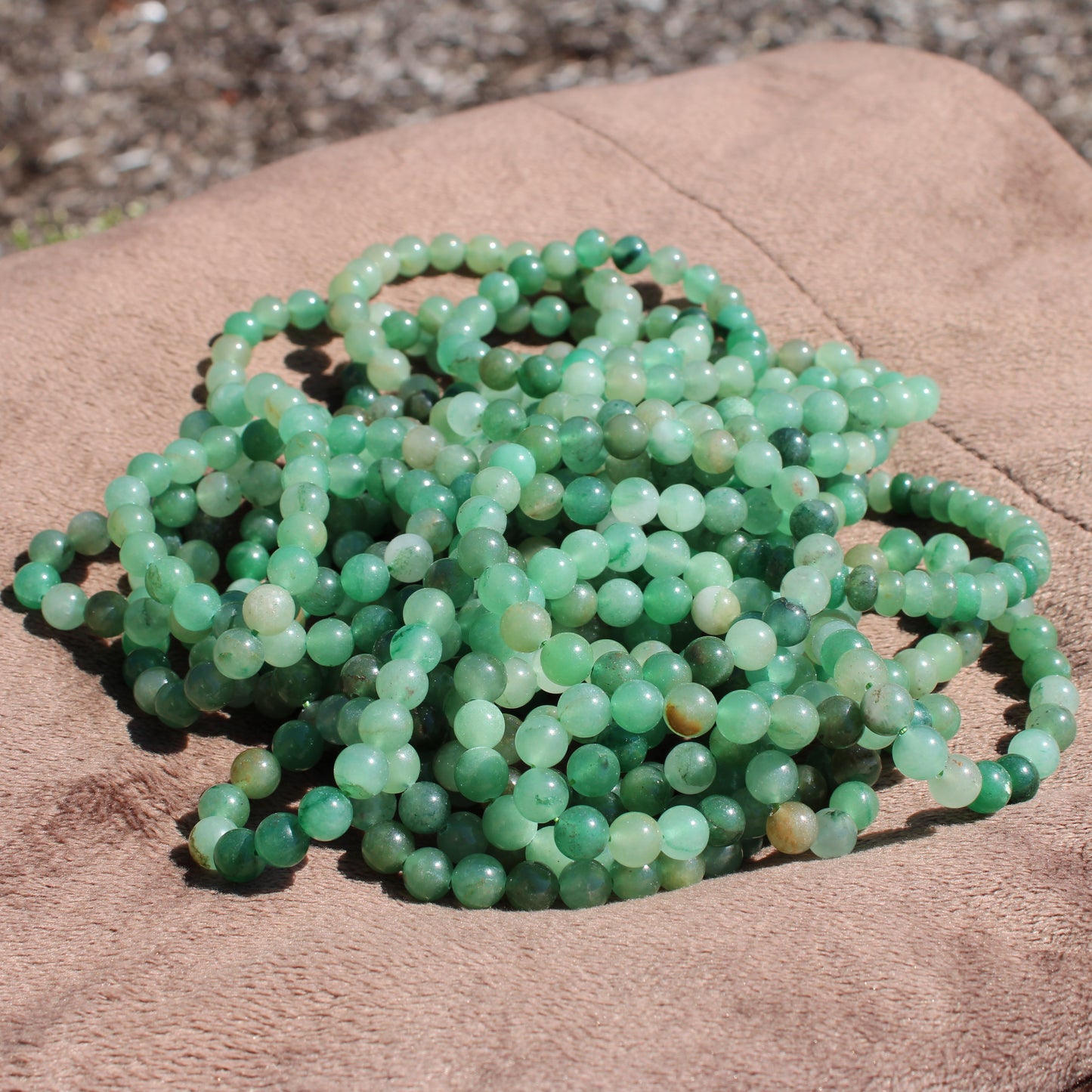 Green Aventurine Bracelet made of smooth round beads in various green shades for stylish fashion wear