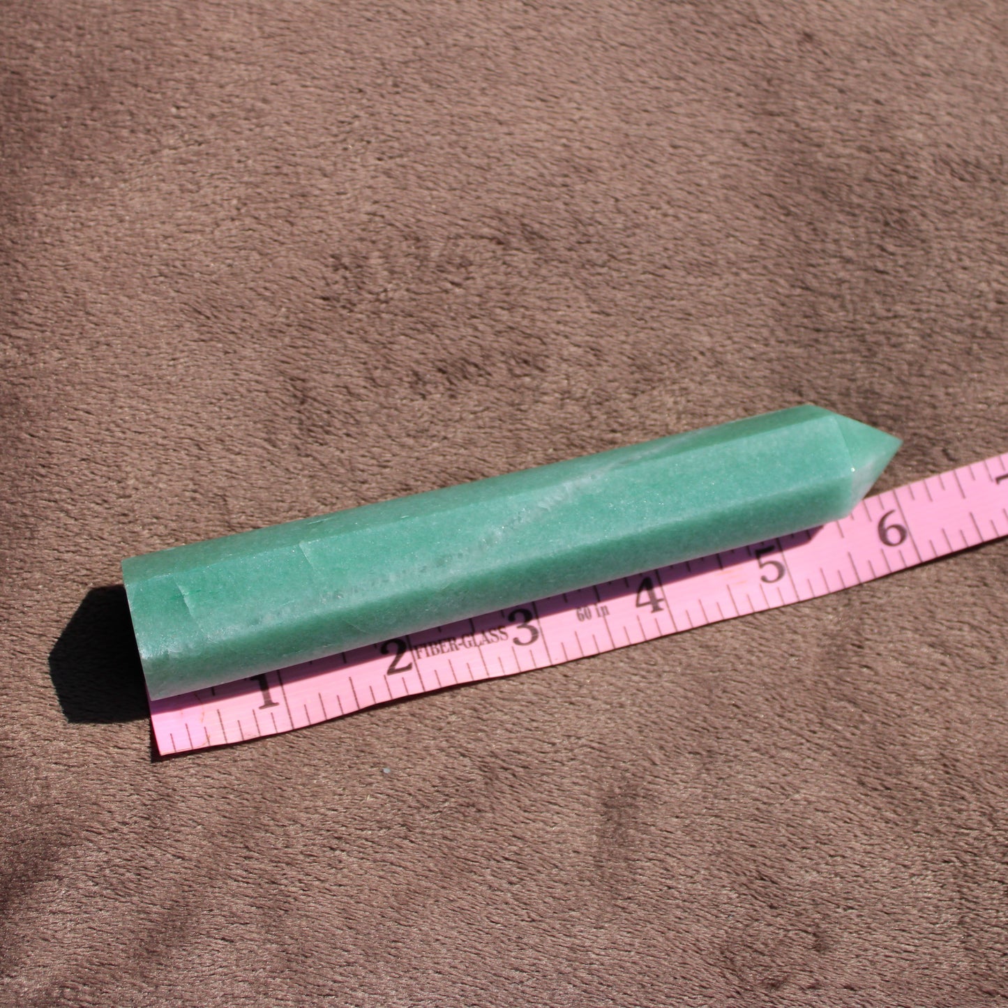 Green Aventurine tower crystal measuring 6 inches long with a polished surface