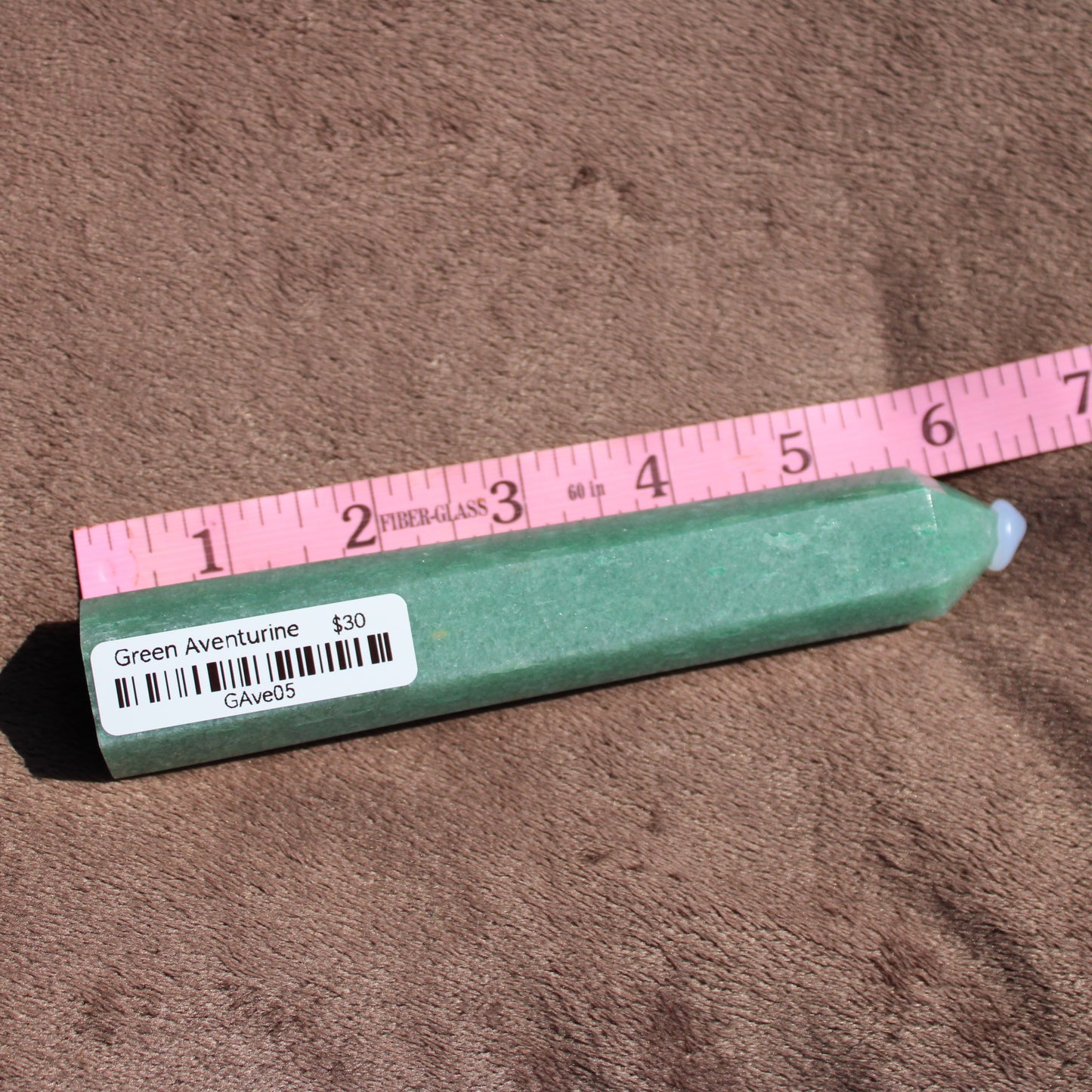 Green Aventurine tower with a smooth finish, ideal for crystal healing and decoration