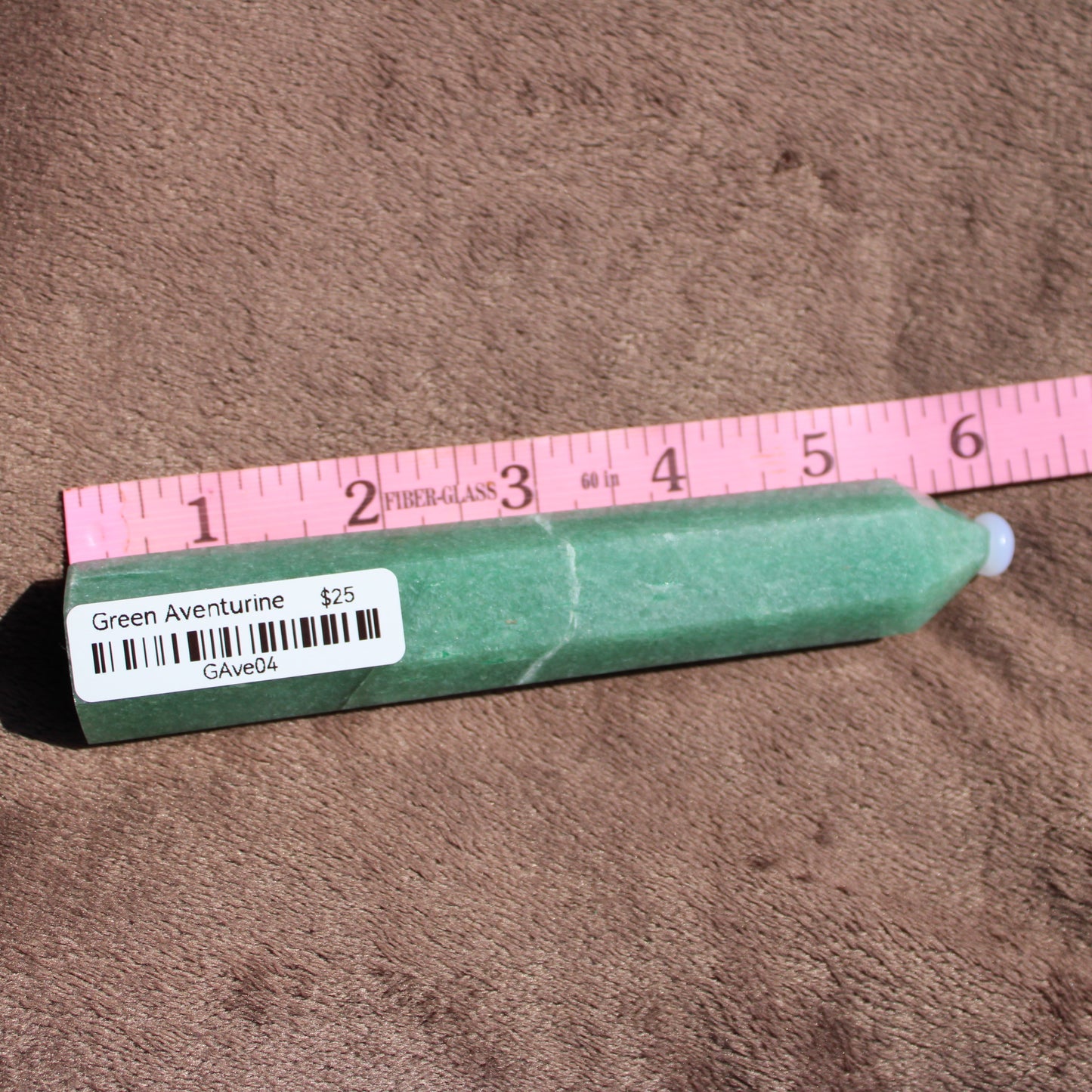 Green Aventurine tower with a smooth finish and polished surface, perfect for decor or healing purposes