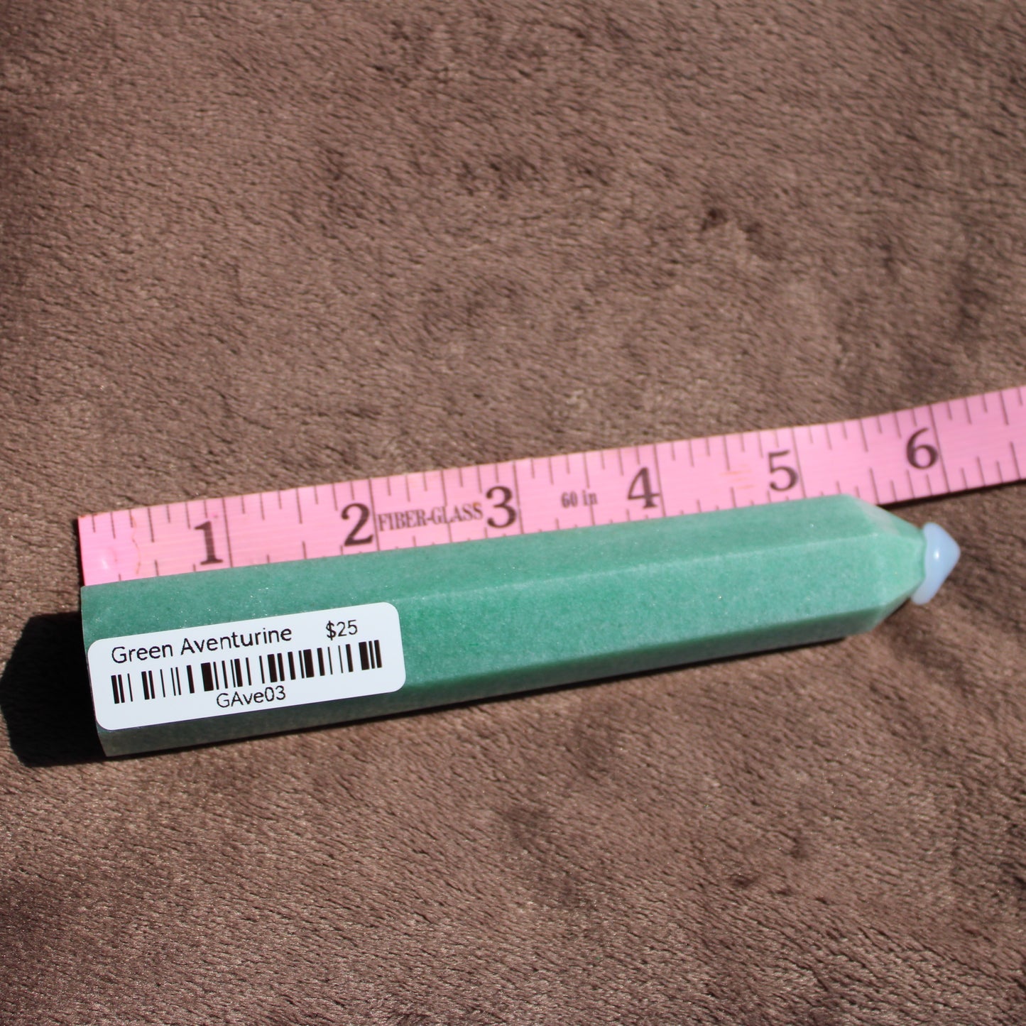 Green Aventurine tower elongated in shape, showcasing its natural green color and smooth finish