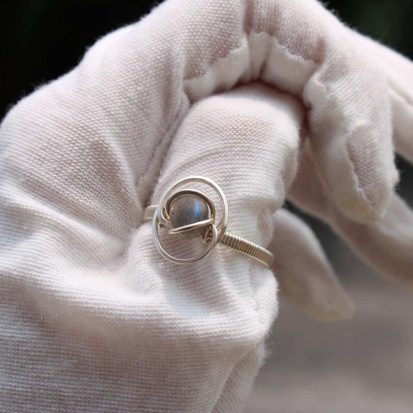 Elegant Labradorite ring size 10 featuring a unique silver twisted design
