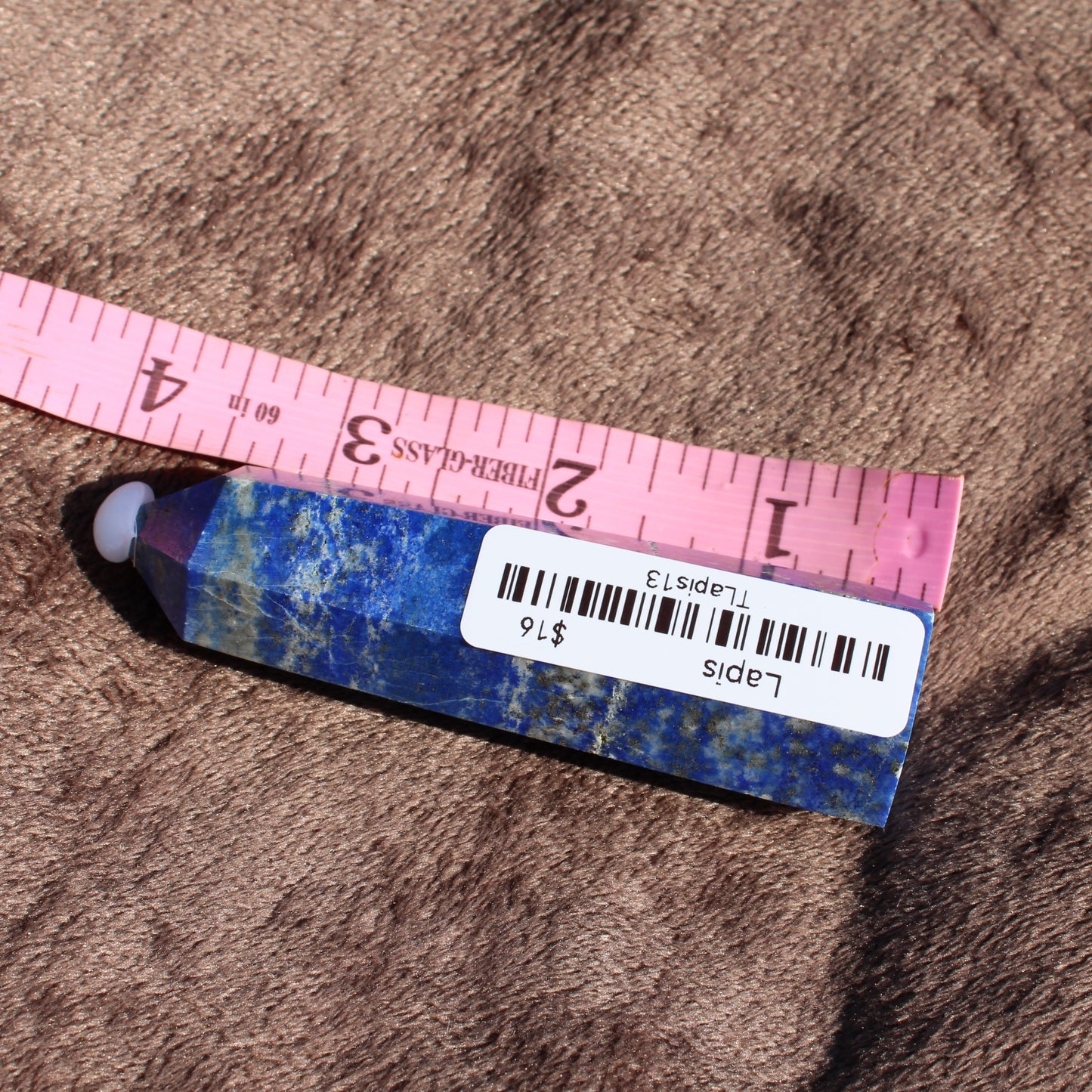 Lapis Tower Collection Crystal Obelisk in Blue and Gold with Measurement Tape for Size Reference