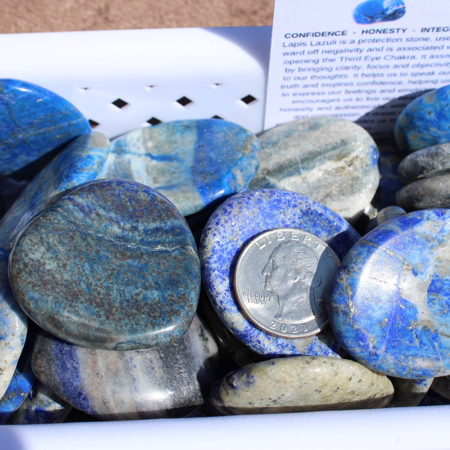 Lapis worry stone collection in vibrant blue tones with a quarter for size reference - Autumn 2025