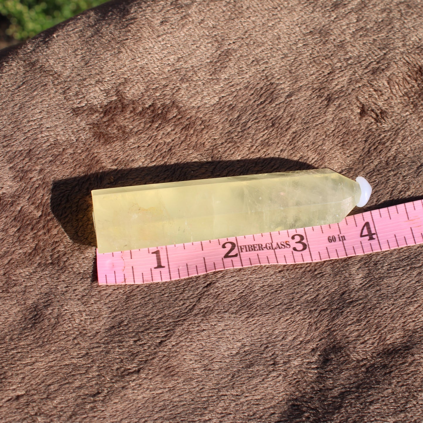 Lemon Quartz Tower from Different Branches LLC showcasing vibrant yellow hues and smooth edges