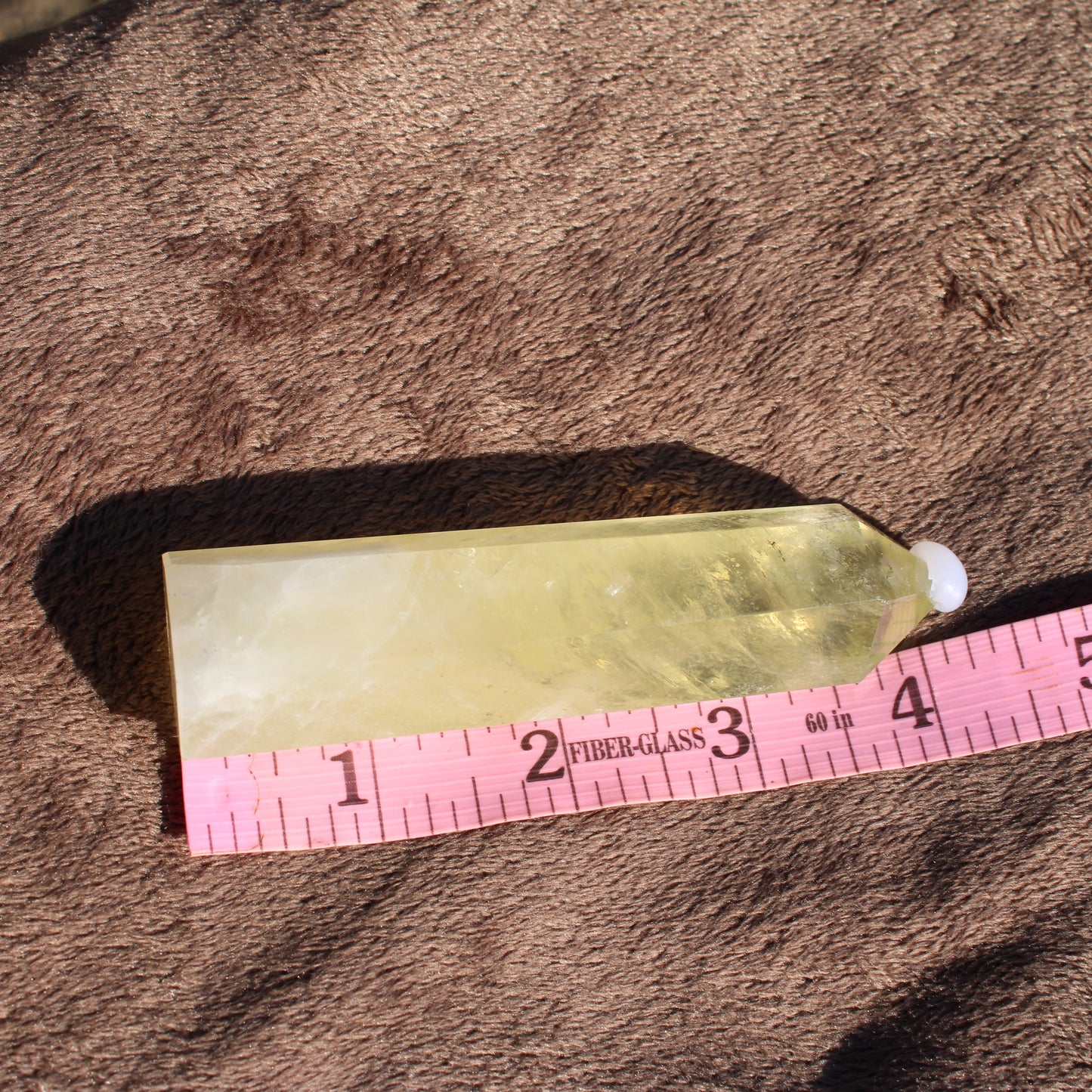 Lemon Quartz Tower with a vibrant yellow color, ideal for home decor and crystal healing