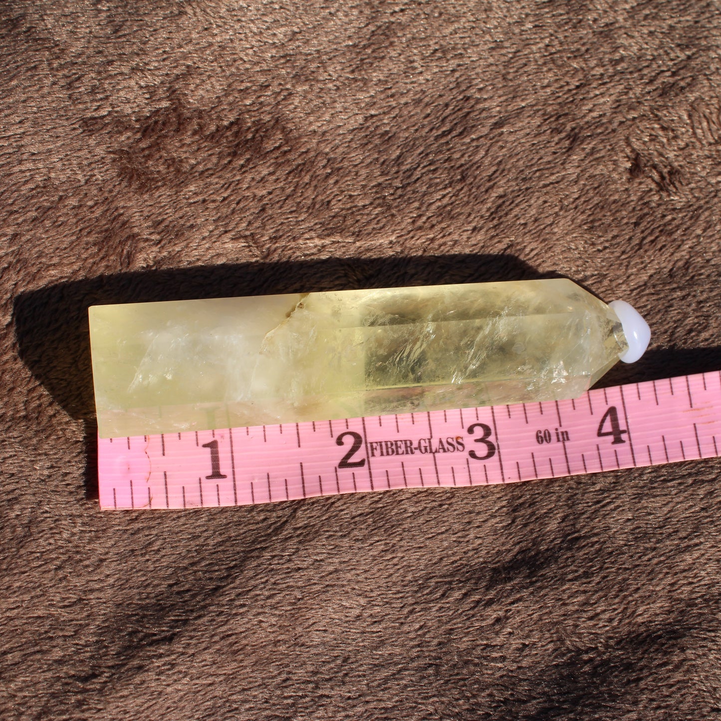 Lemon Quartz Tower from Different Branches LLC showcasing a beautiful yellow hue and natural crystal texture