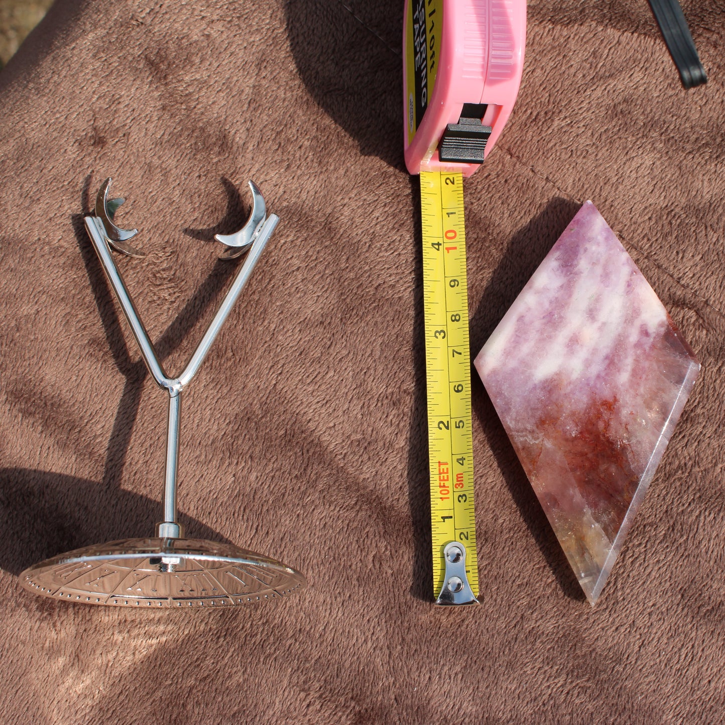 Mixed Quartz Diamond crystal from Different Branches LLC shown next to a tape measure for size reference
