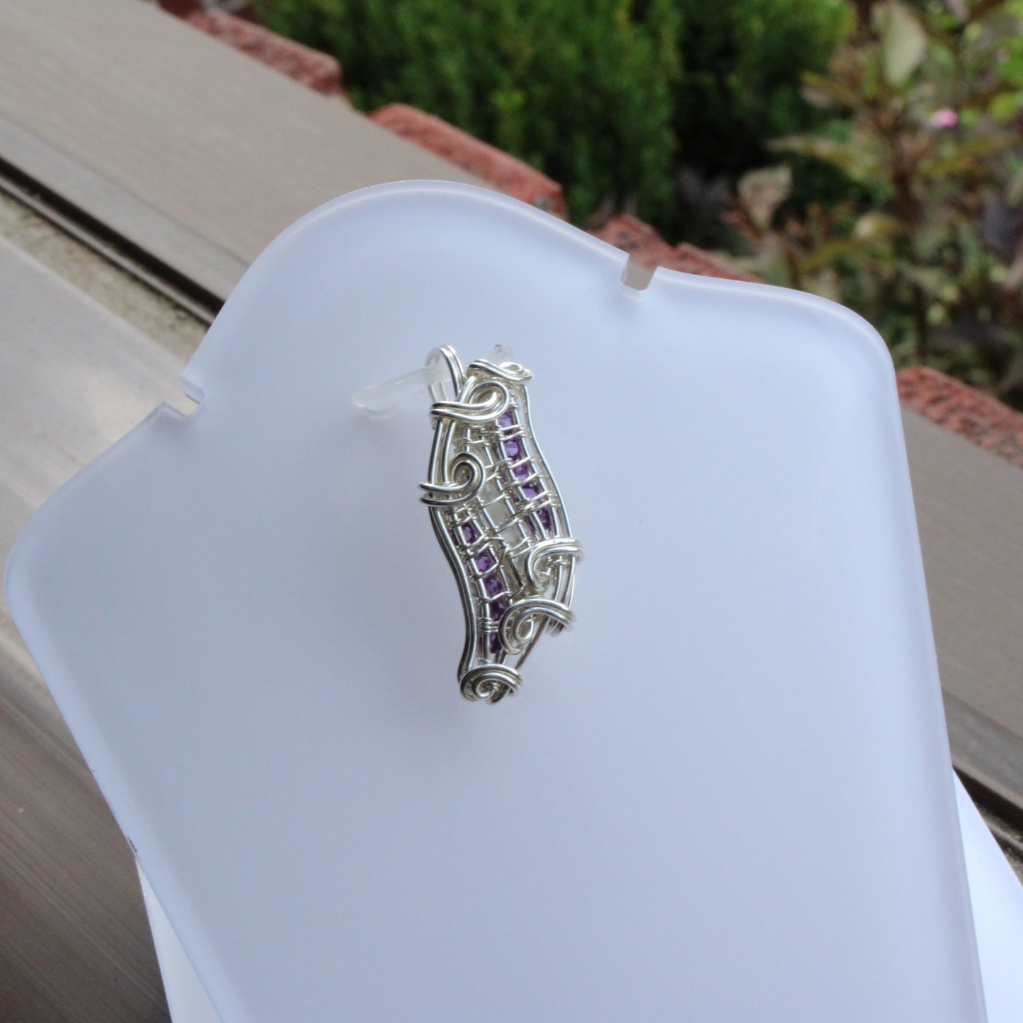 Moonstone, Amethyst, Sterling silver Pendant featuring intricate wire design and elegant gemstone accents