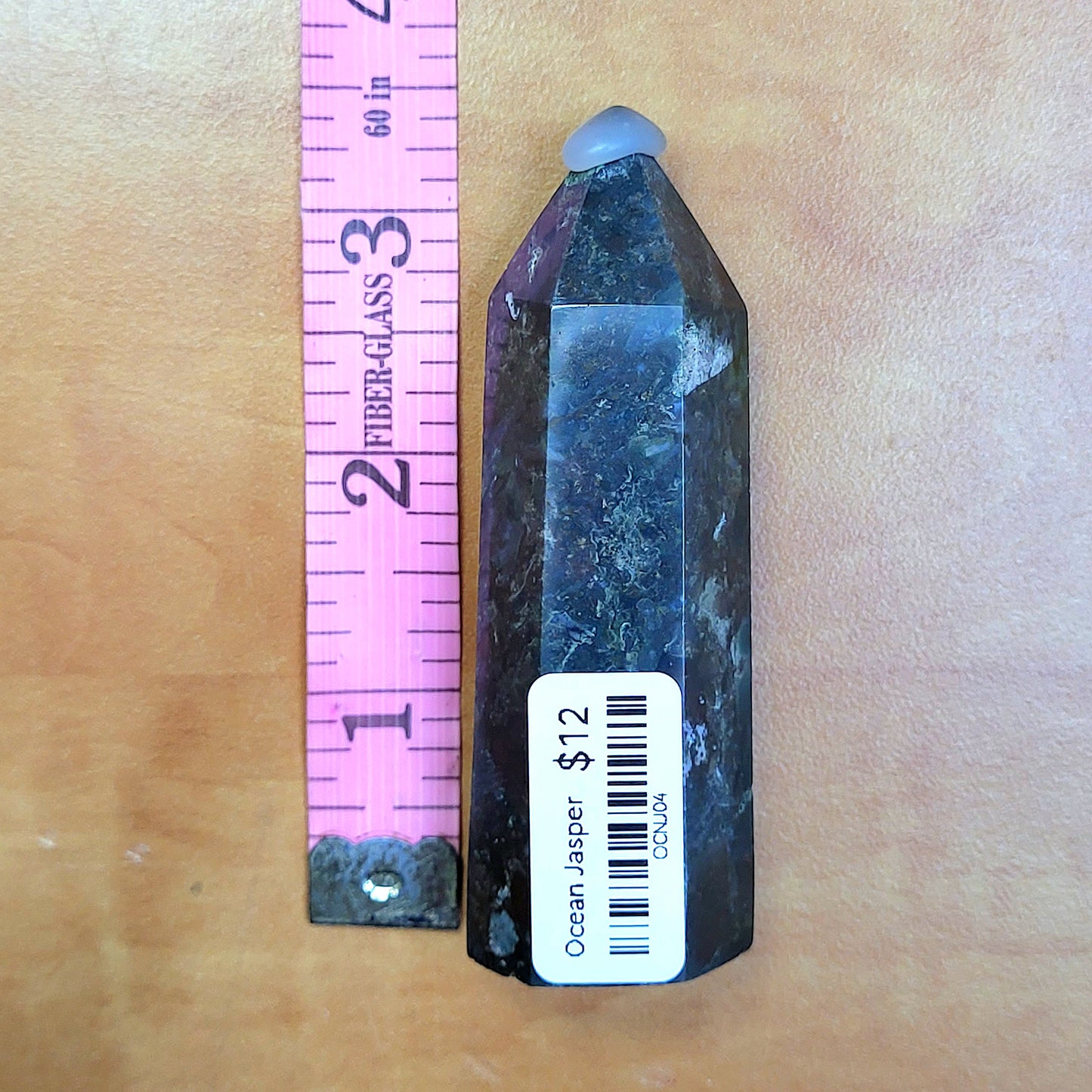 Ocean jasper tower with smooth surface and pointed top, perfect for home decor or meditation