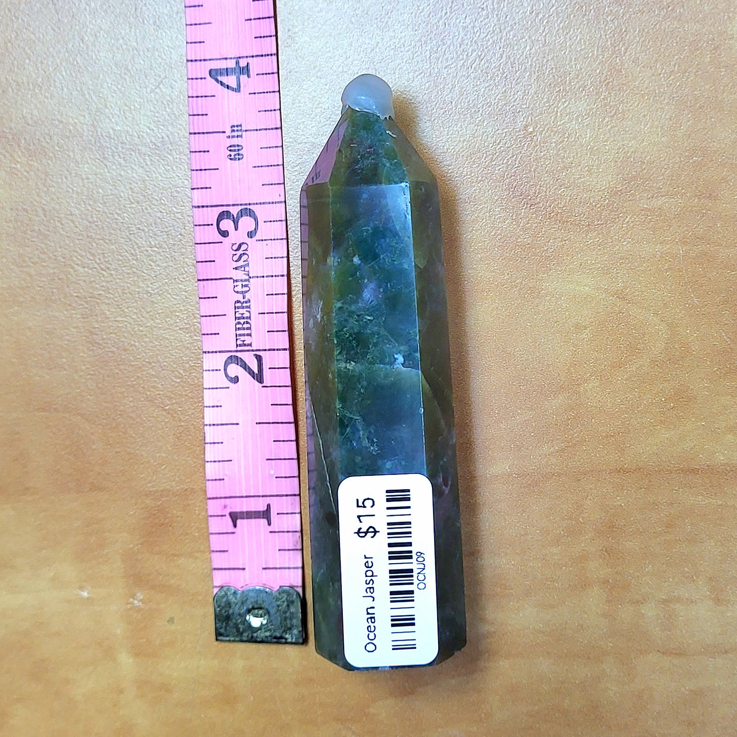 Ocean jasper tower with varying green patterns, ideal for crystal enthusiasts and home decor