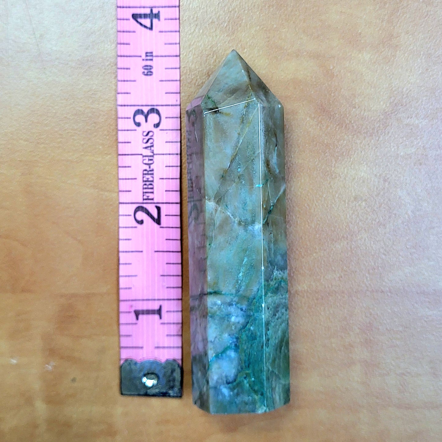 Ocean jasper tower crystal with unique patterns, measuring approximately 3 inches tall