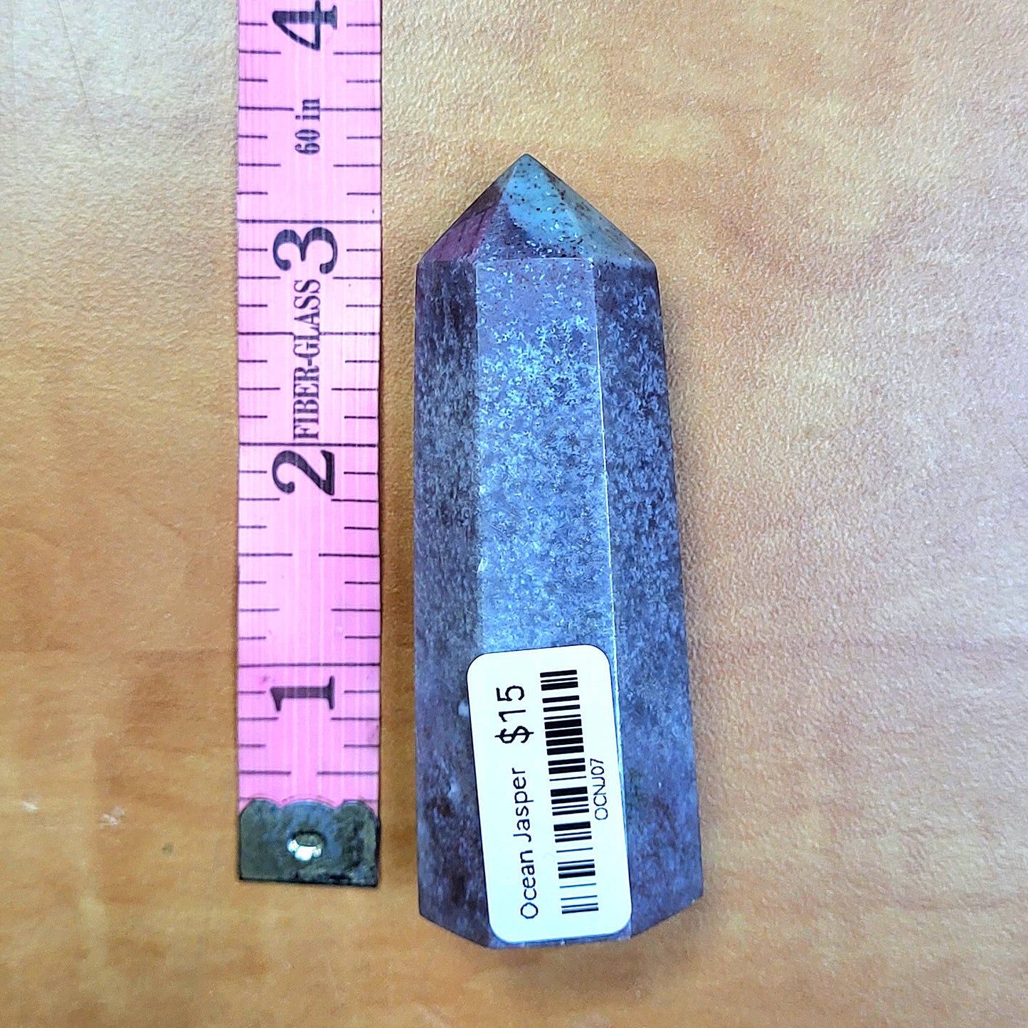 Ocean jasper tower with a polished finish and natural colors for crystal enthusiasts