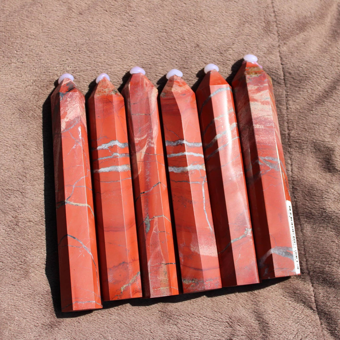 Set of Red Jasper Towers with Polished Surfaces and Unique Marbling Patterns