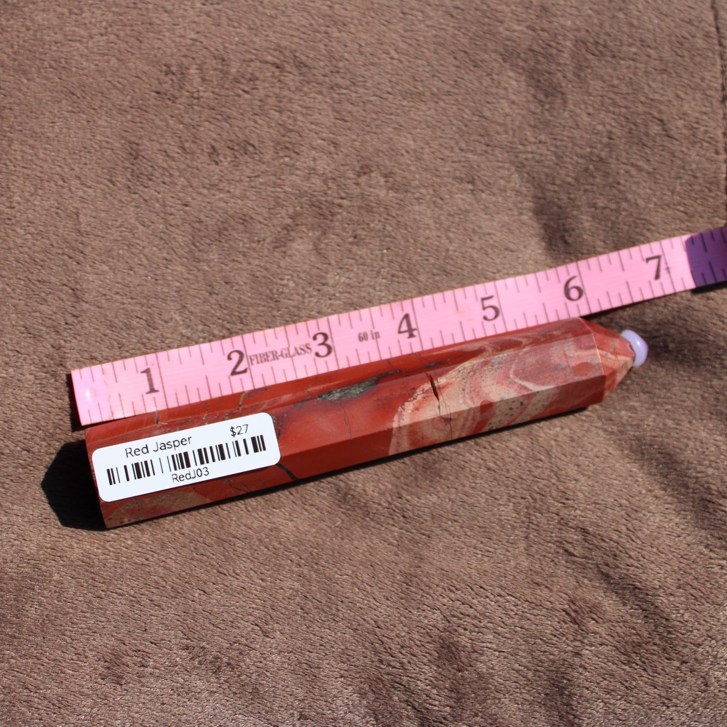 Red Jasper Tower with natural patterns, ideal for crystal healing and decorative purposes