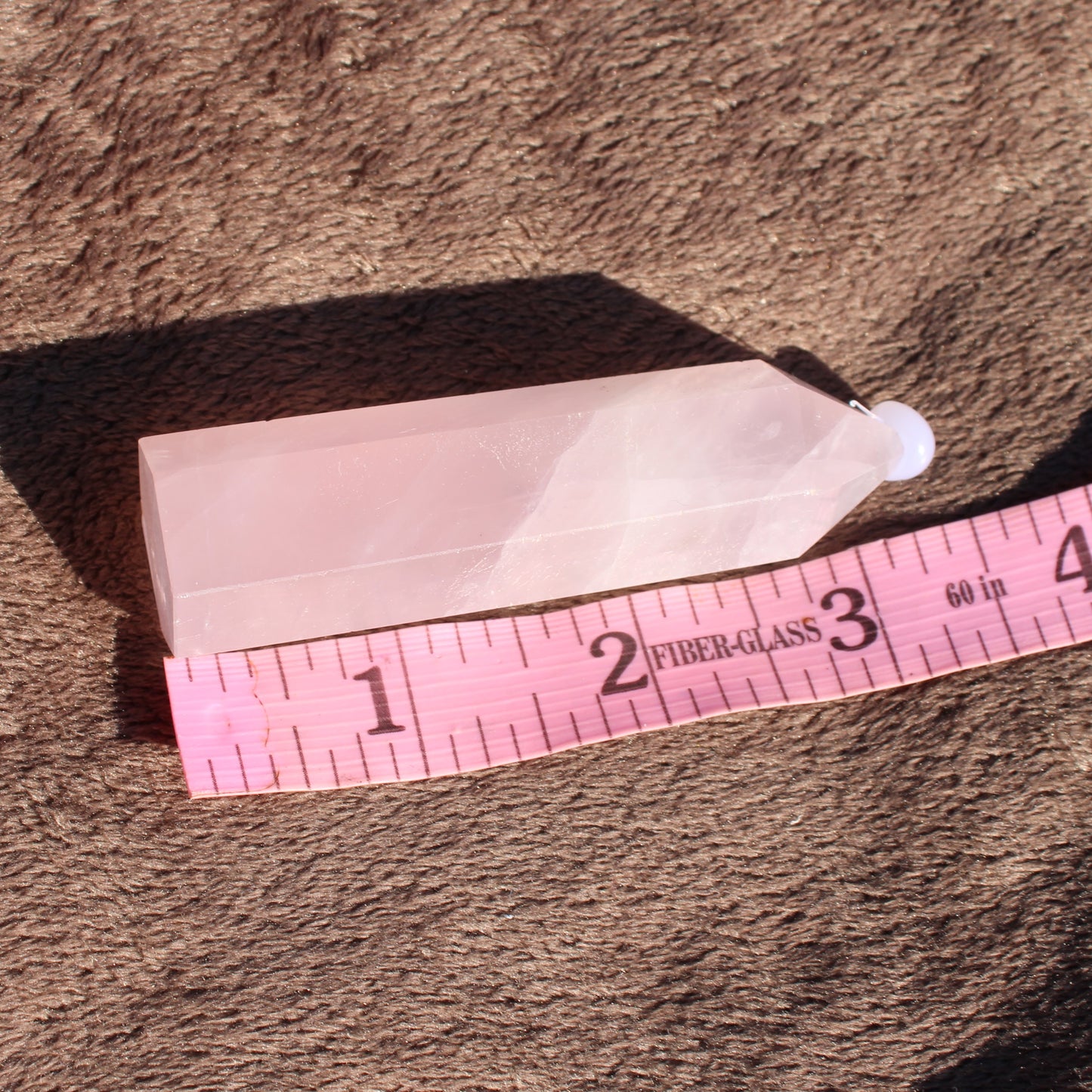 Rose Quartz tower with a smooth surface, ideal for healing and home decor