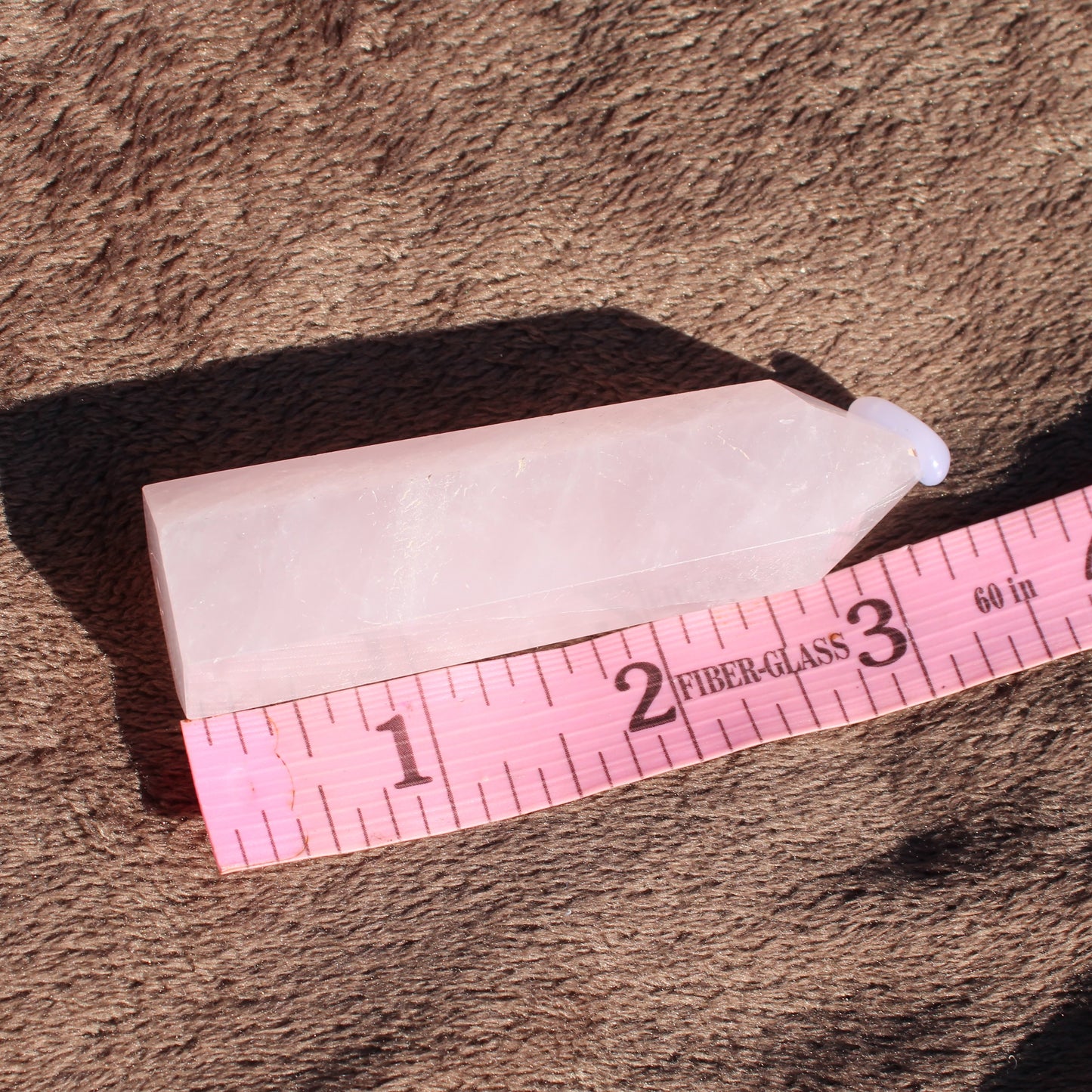 Rose Quartz tower in soft pink hue, perfect for healing and decorative purposes