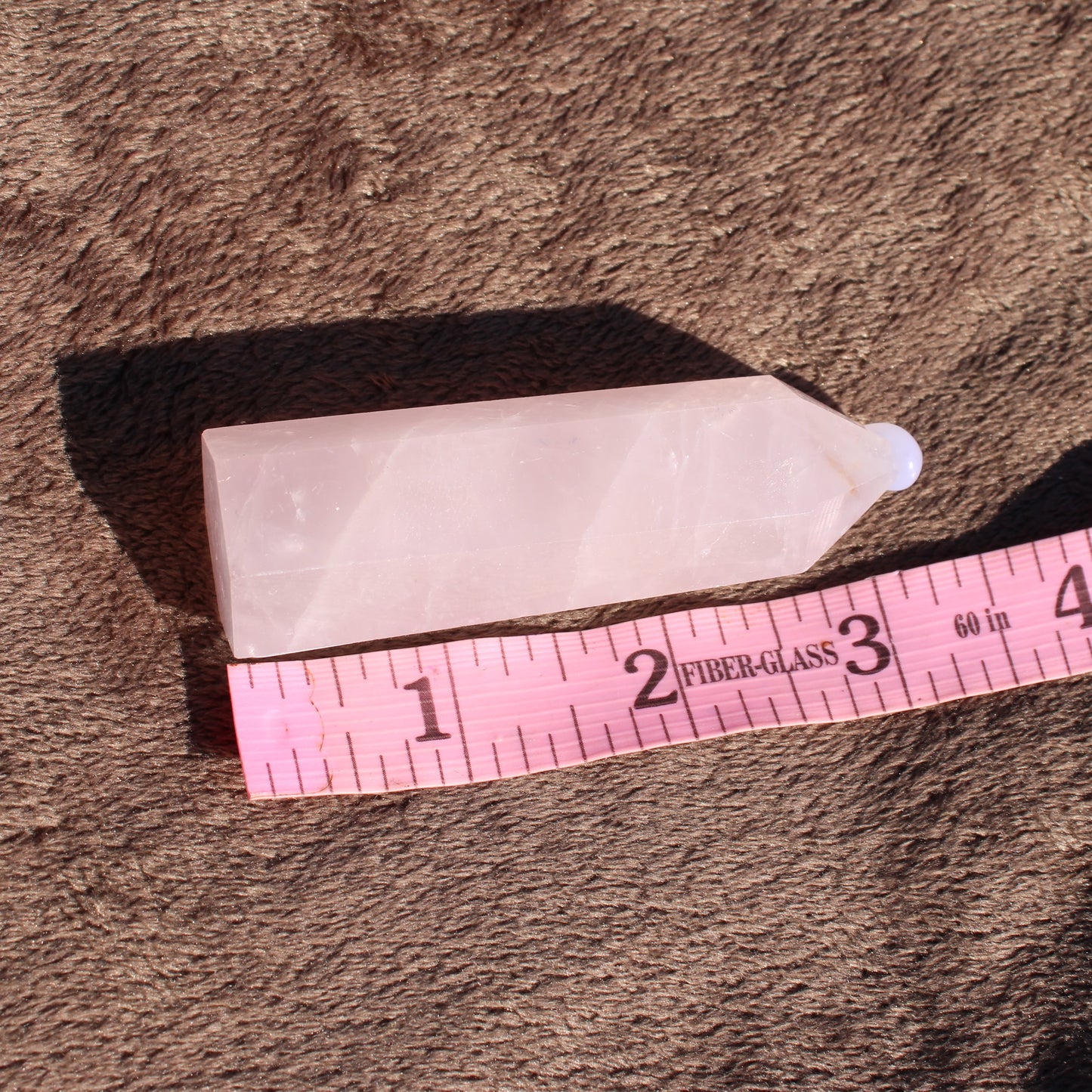 Rose Quartz tower with a smooth finish, ideal for crystal healing and meditation