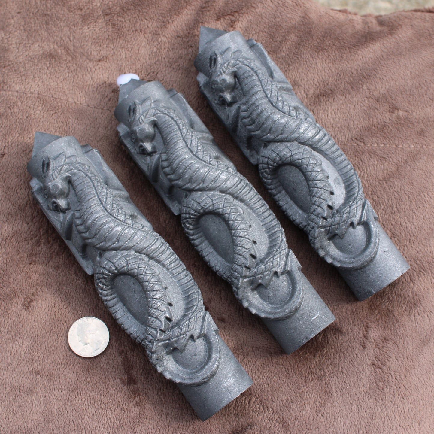 Set of three Shungite Dragon Tower crystals intricately carved with dragon design by Different Branches LLC