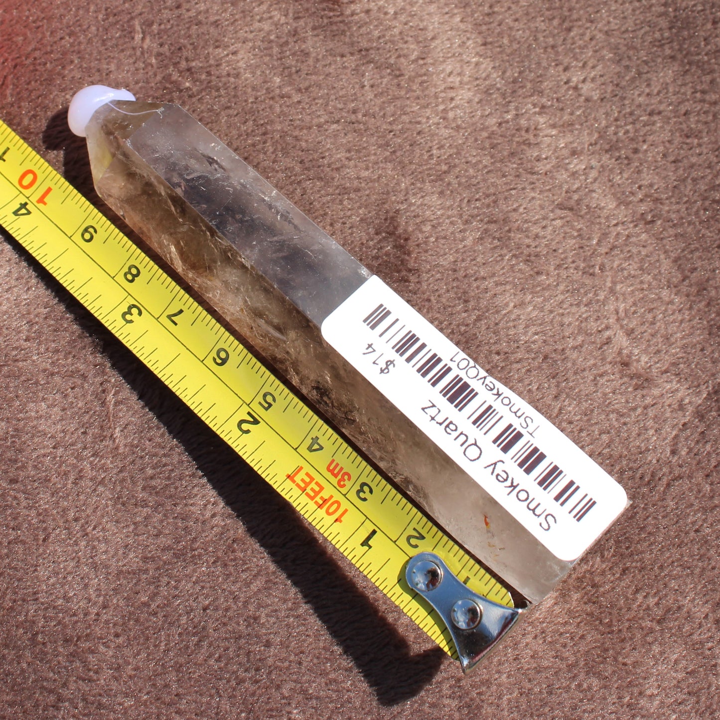 Smokey Quartz Tower crystal measuring about 4 inches from Different Branches LLC