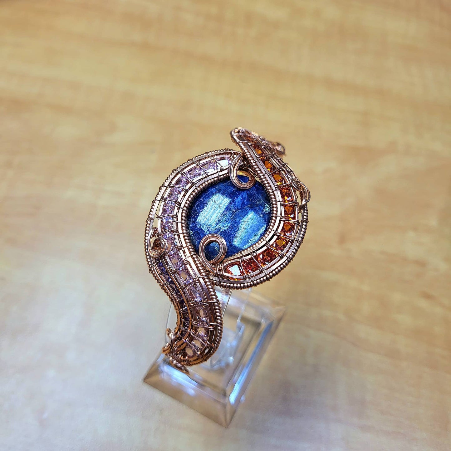 Sodalite raw copper bracelet with intricate wire design and vibrant blue stone, handcrafted by Different Branches