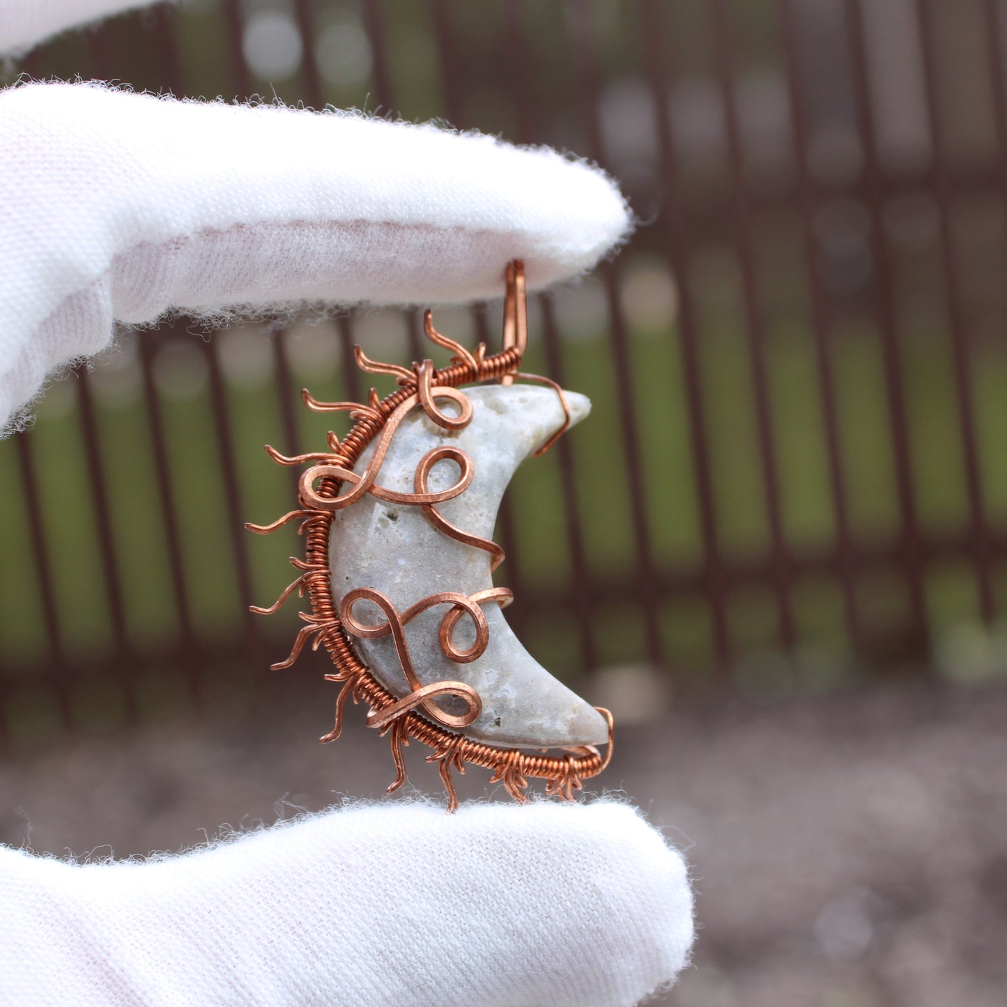 Handcrafted pendant from Sun and moon copper collection featuring a crescent moon design