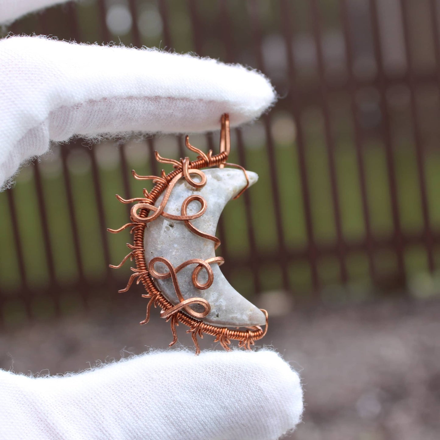 Handcrafted pendant from Sun and moon copper collection featuring a crescent moon design