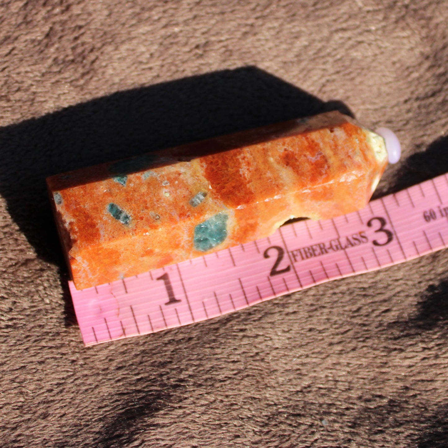 Natural Sunstone tower with orange and green flecks, perfect for crystal healing and decor