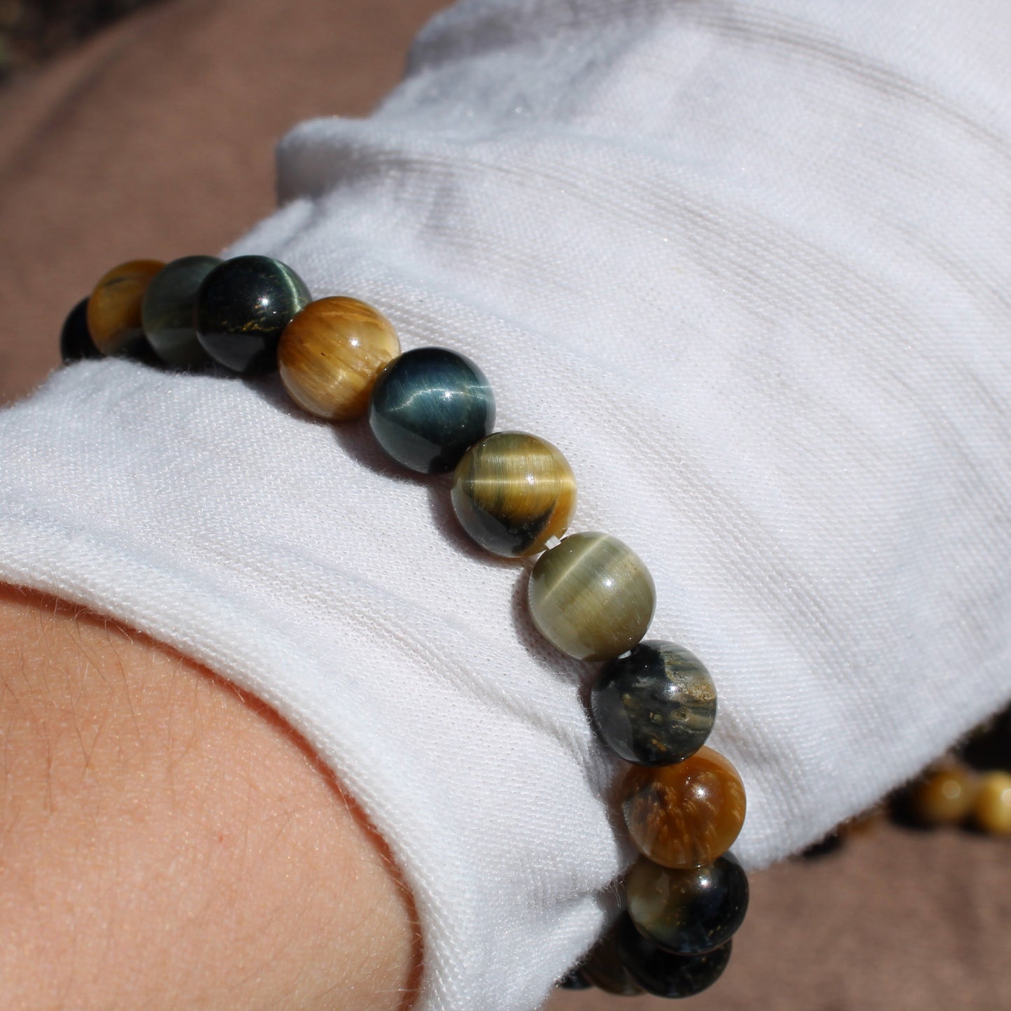 Tiger eye Bracelet featuring round beads with rich golden and dark hues for stylish wristwear
