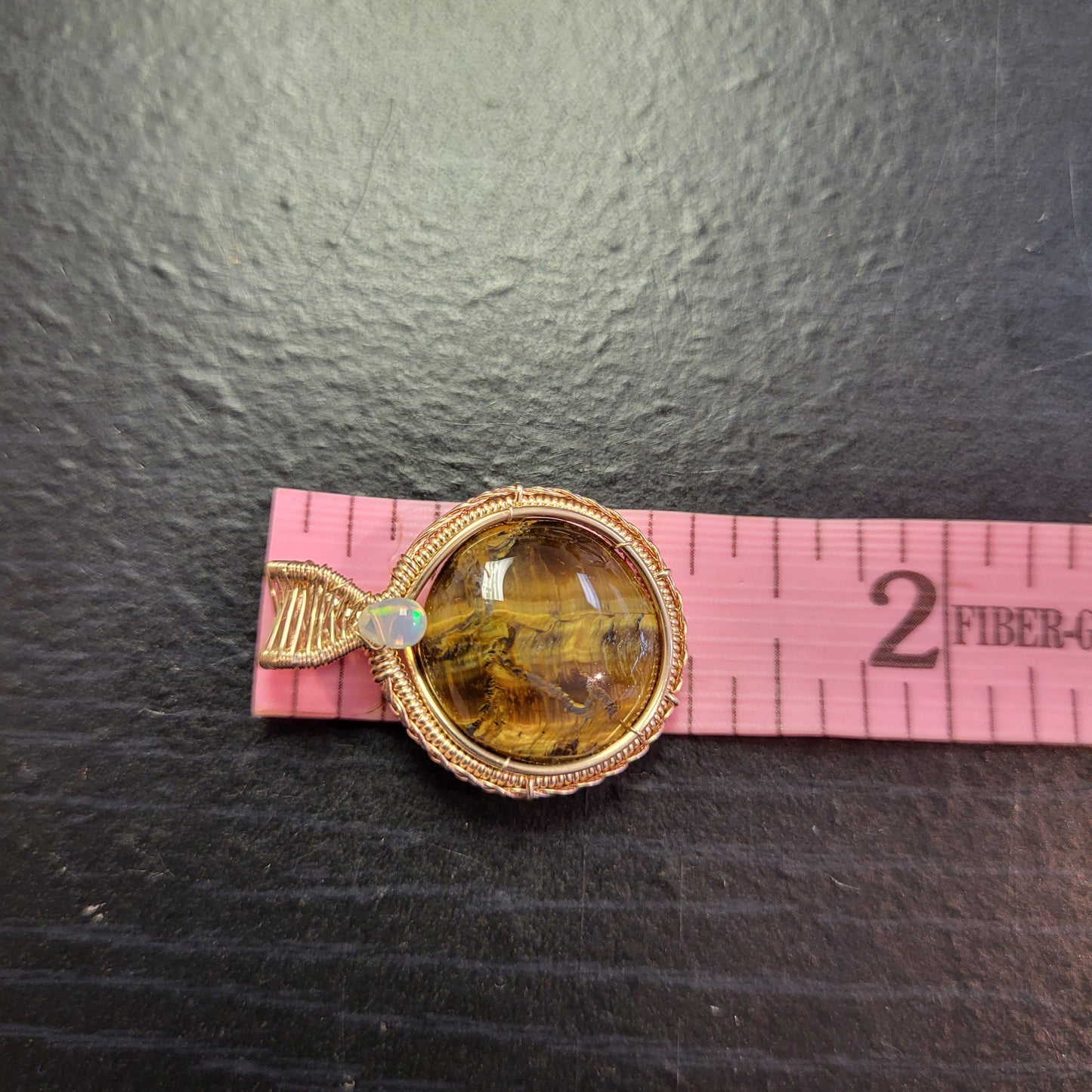 Tiger eye Ethiopian Opal 14k yellow and rose gold fill pendant showcasing intricate craftsmanship