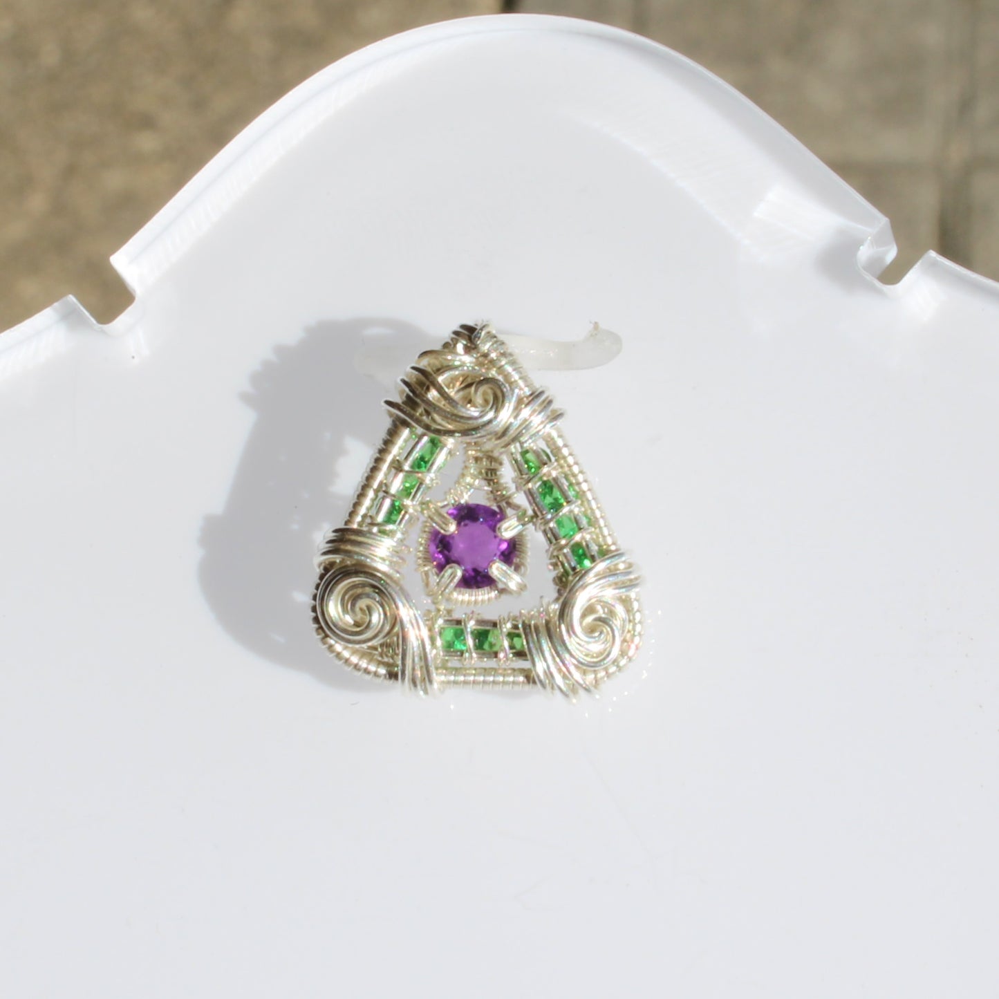 Handcrafted jewelry featuring Tsavorite and amethyst set in sterling silver for a unique design