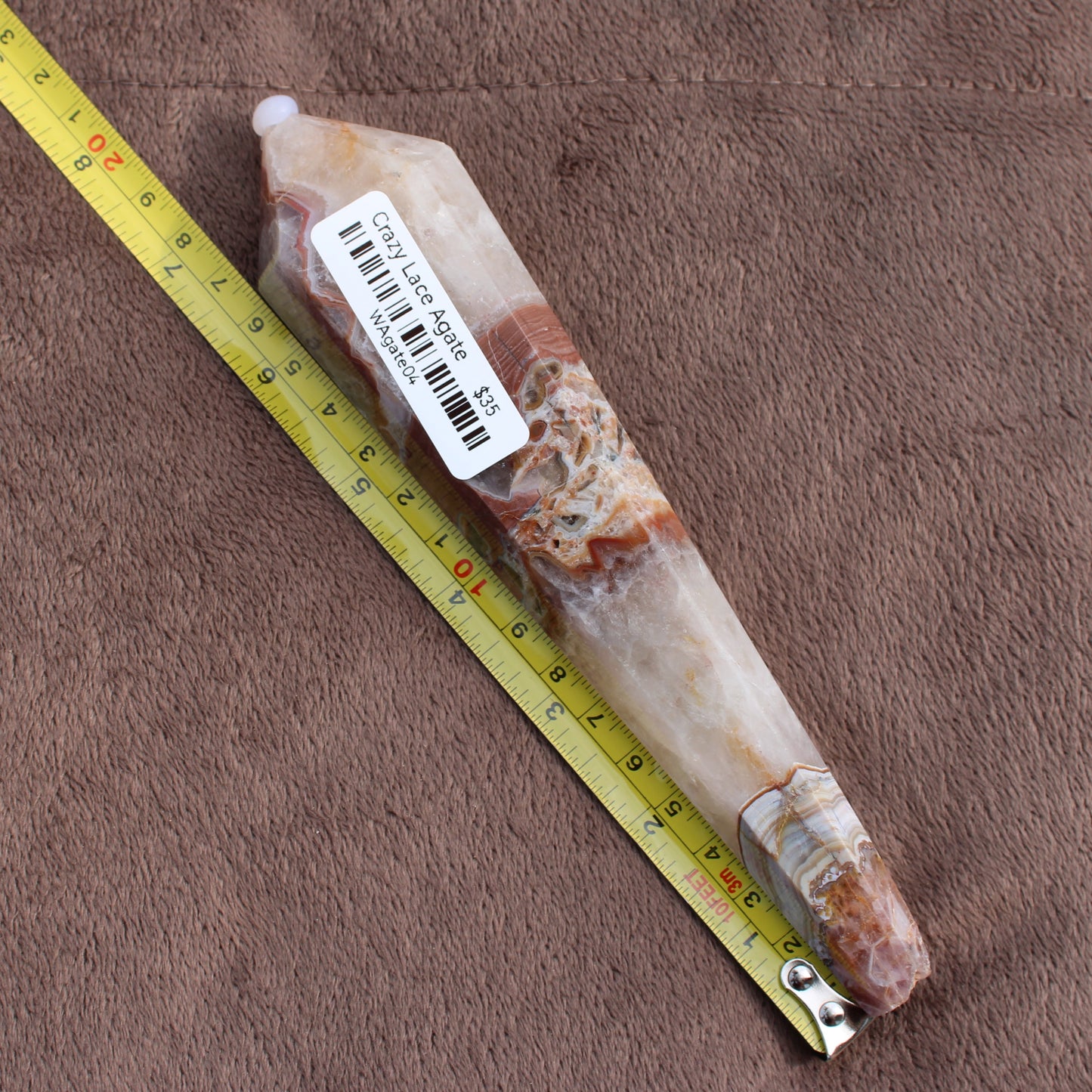 Crazy Lace Agate Wand crystal measuring about 8 inches with natural brown and white patterns